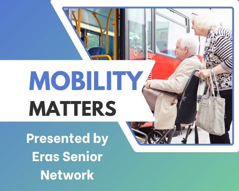 A caretaker assists a person using a wheelchair onto a bus