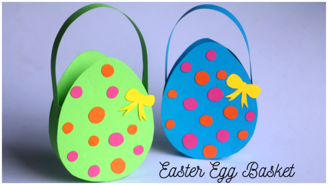 Two easter egg-shaped paper baskets, one green with red spots, one blue with red spots. Both have yellow paper bows on them.