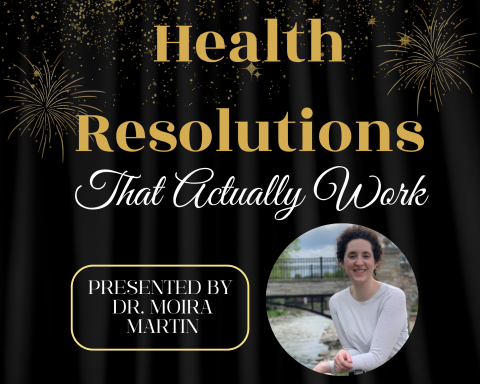 a woman with short dark hair smiles at the camera