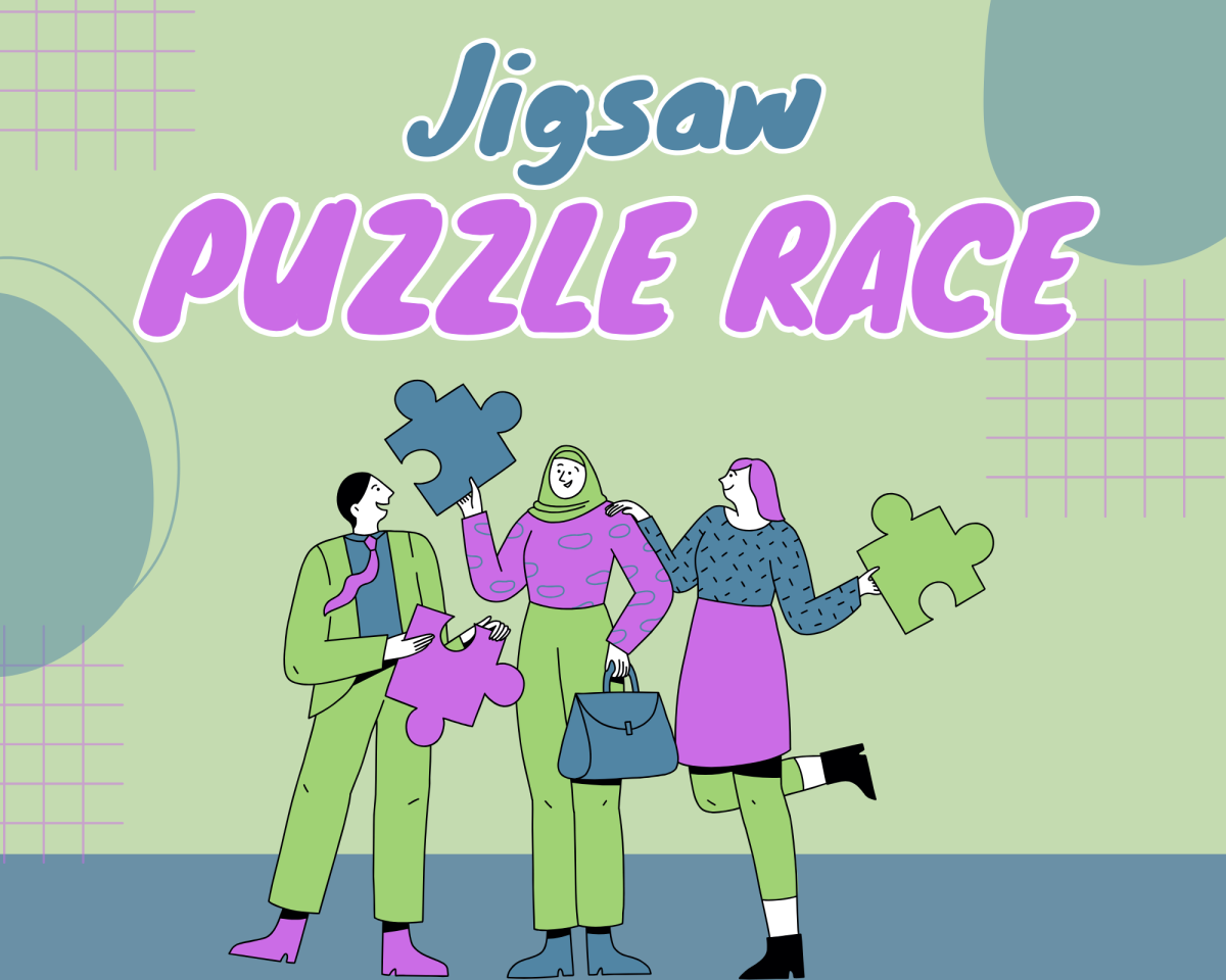 Three people holding giant puzzle pieces